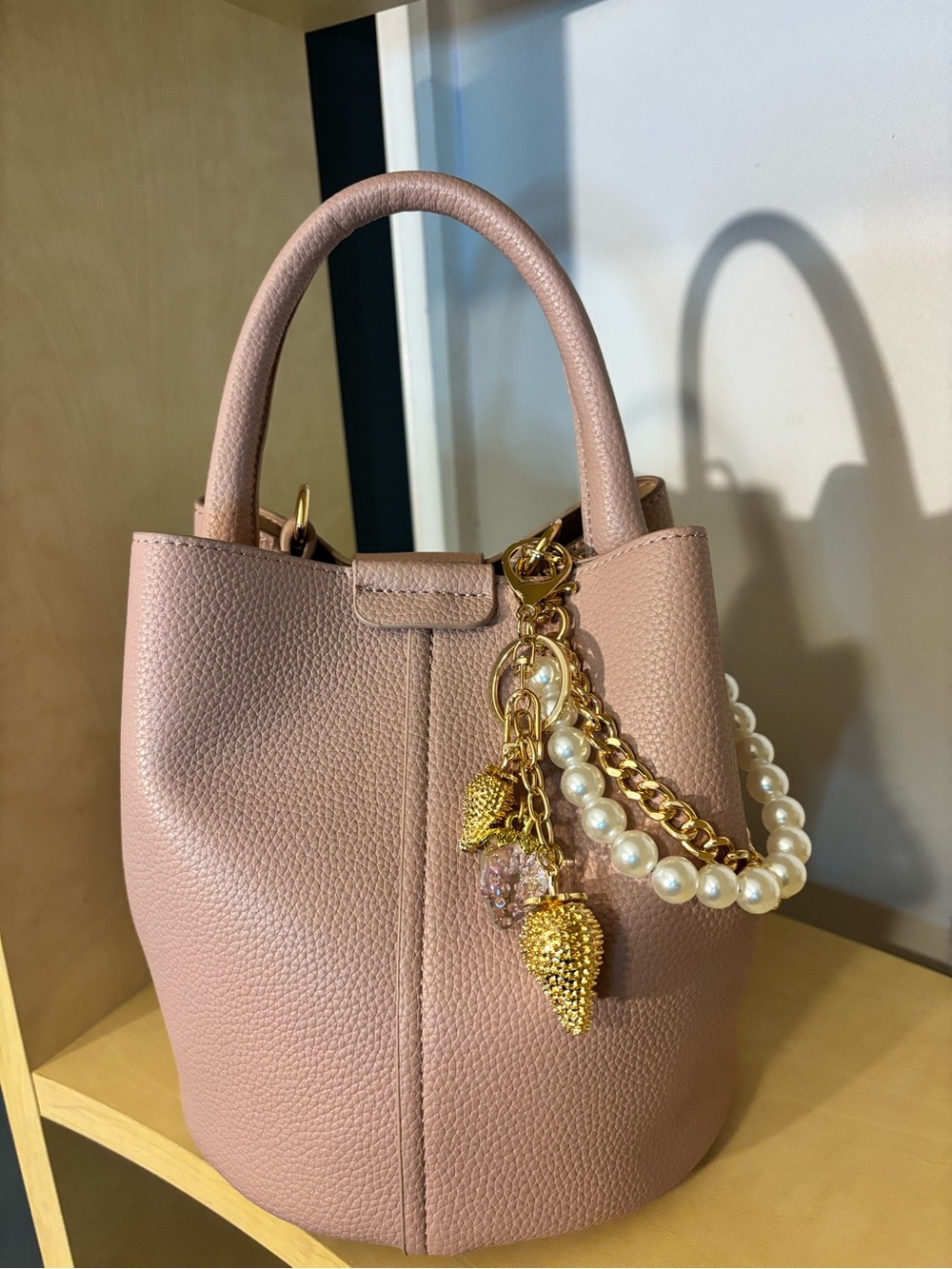 Women's Blush Pink Leather Bucket Bag with Pearl Charm